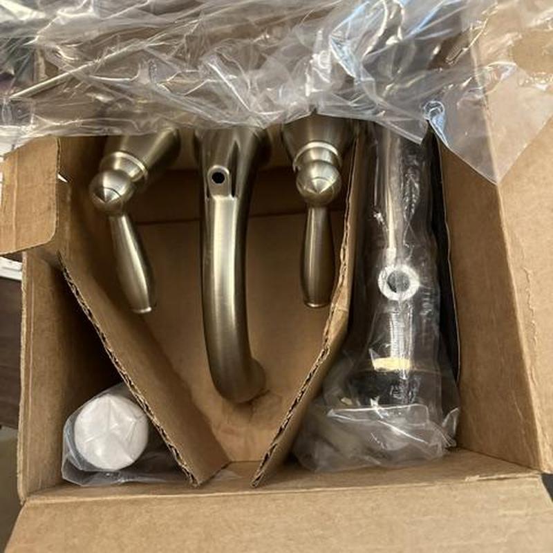 Basin faucet and valve set in packaging