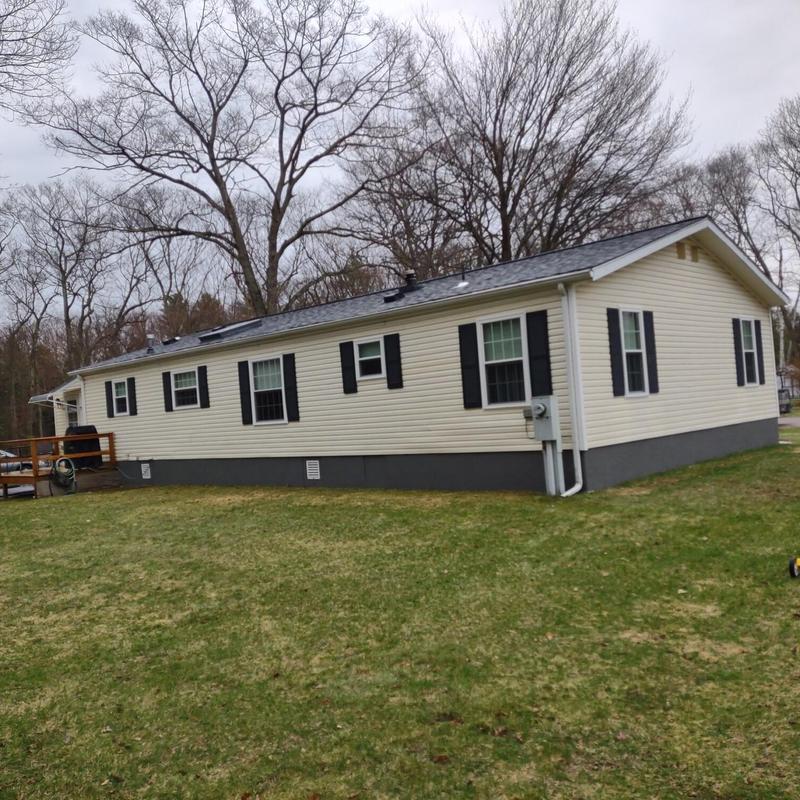 Asphalt shingle roof on single-story house