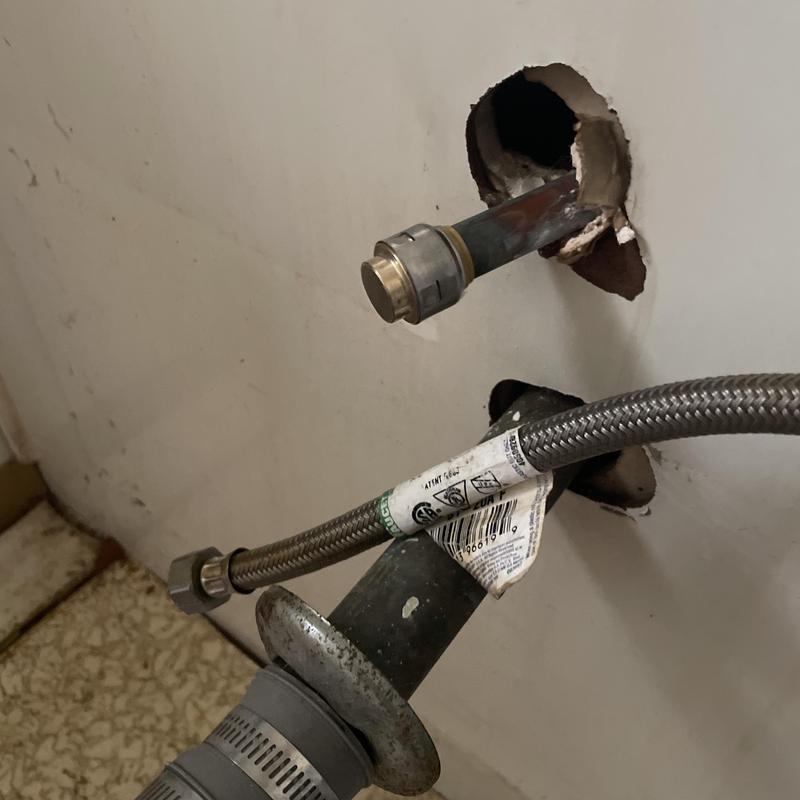 Hot water line capped inside wall for remodel