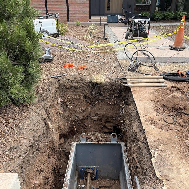 Meter pit installation with copper tap piping excavation