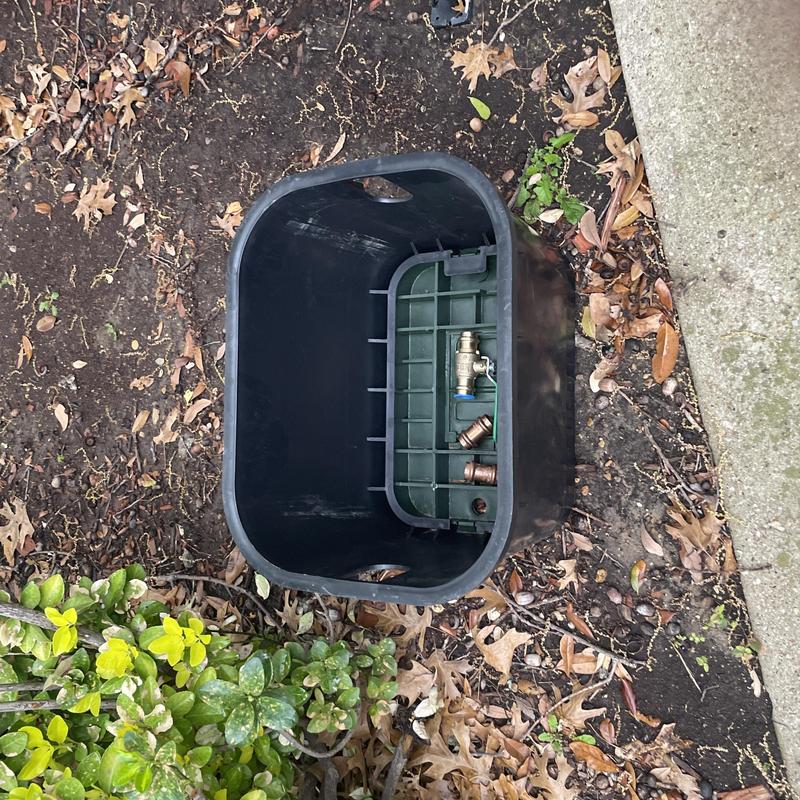Main water line shut off valve in valve box outdoors