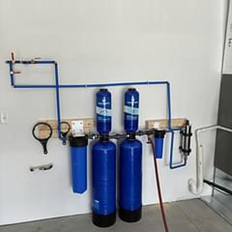 Water conditioning system with blue tanks and filters