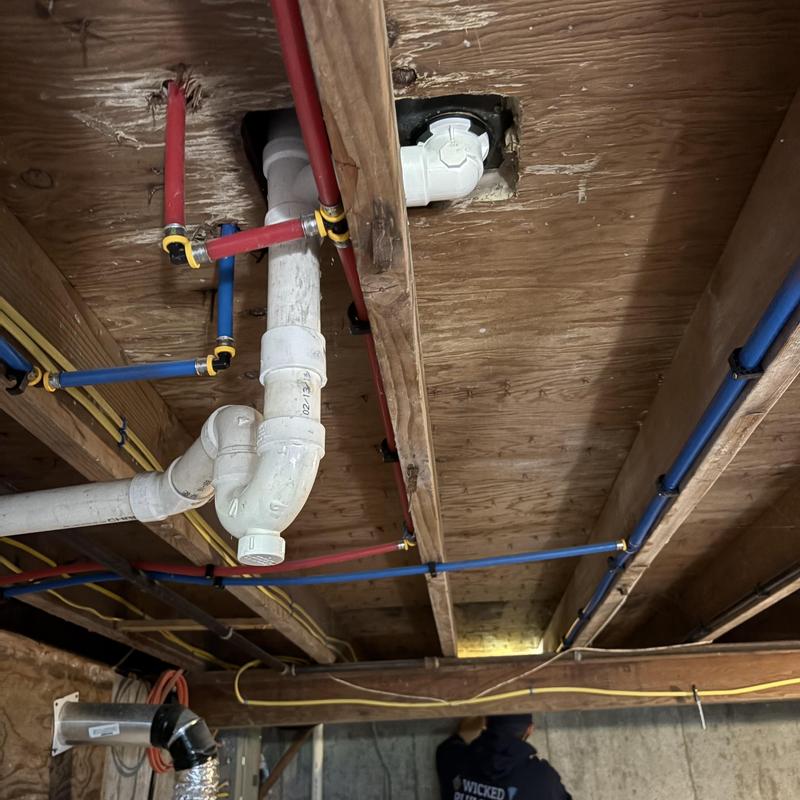 PVC tub drain and new frost-free sillcock installation