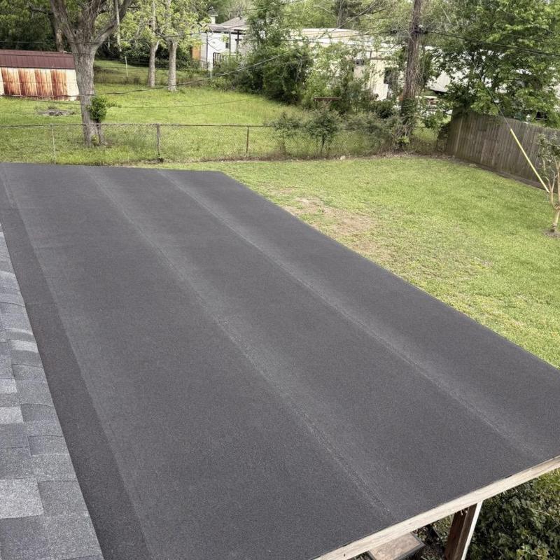 Torch down flat roofing installation on residential home Torch down flat roofing installation on residential home