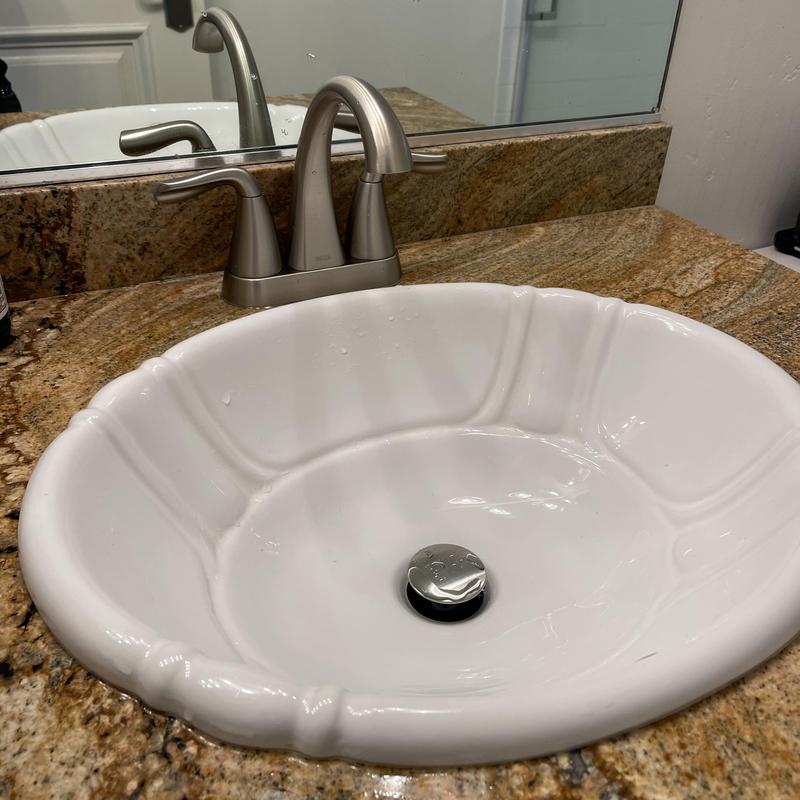 4-inch bathroom faucet and pop-up drain installation