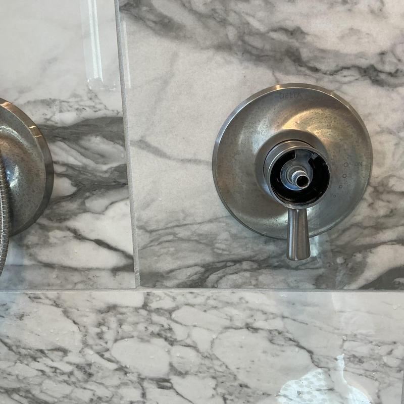 Shower valve cartridge removal and reinstallation in marble wall