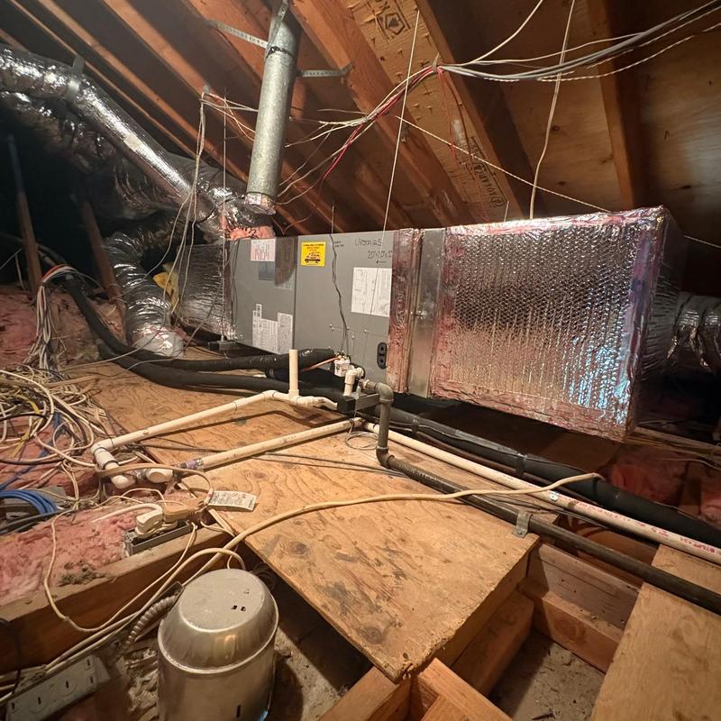 Heat pump air handler unit in attic installation