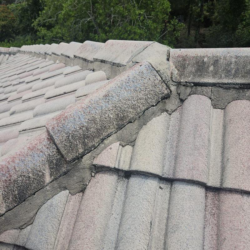 Concrete tile roof mortar with cracks and displacement