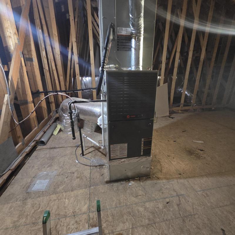 Gas furnace and ductwork in attic space