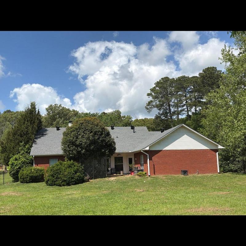 Owens Corning roof system on brick home exterior