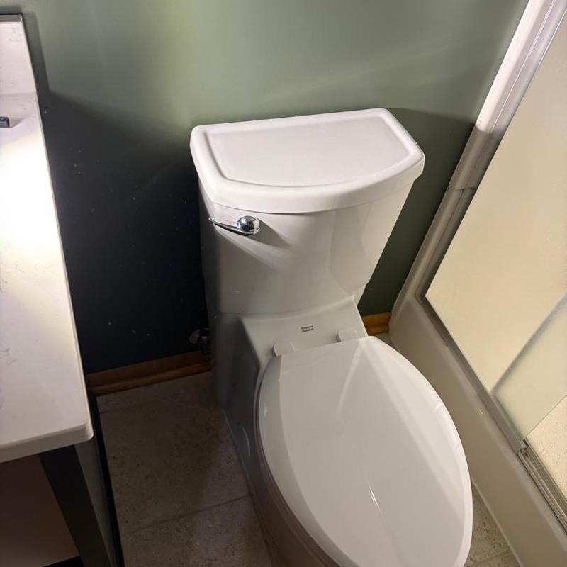 Toilet fixture installation in bathroom remodel