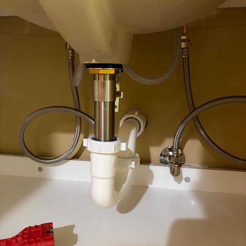 Kitchen sink drain pipes and water supply lines installation