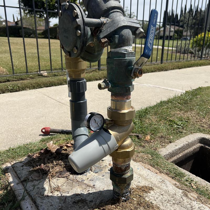 Water pressure regulator with ball valve installation outdoors Water pressure regulator with ball valve installation outdoors