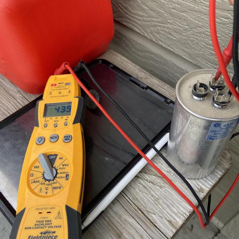 Capacitor testing with digital multimeter on deck