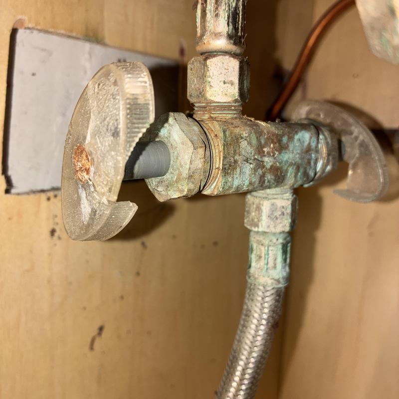 Dual angle stop valve with corroded fittings