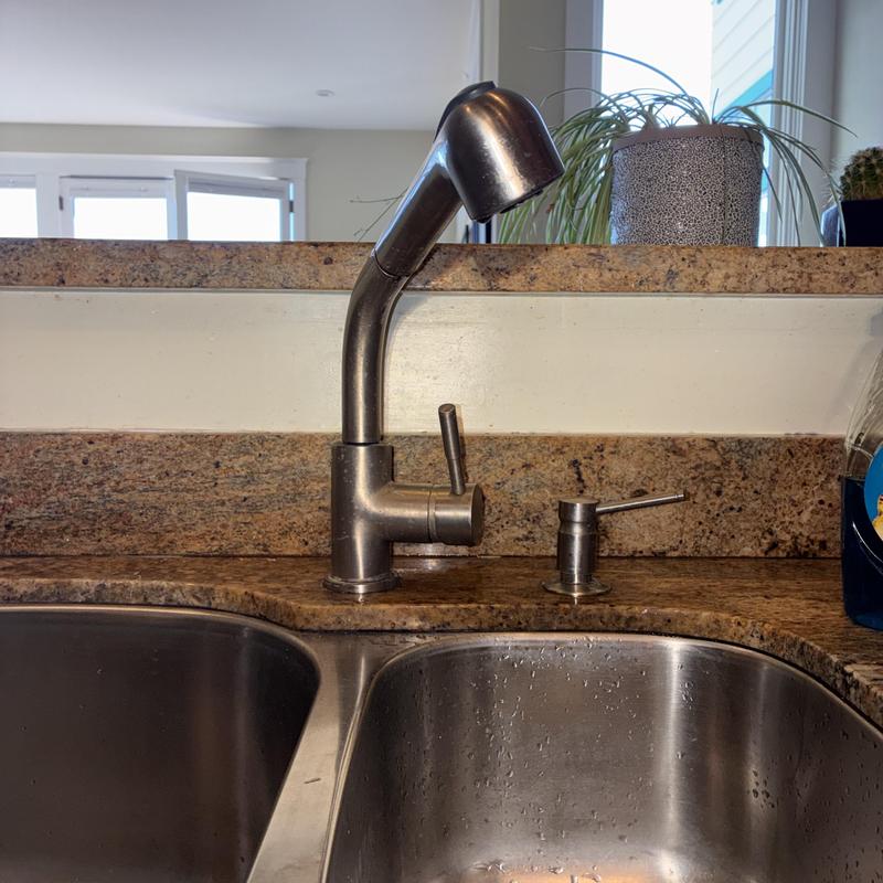 Kitchen faucet and soap dispenser installation on granite