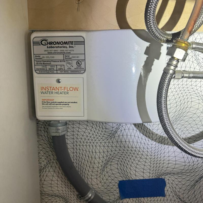 Instant-Flow water heater unit installed under sink