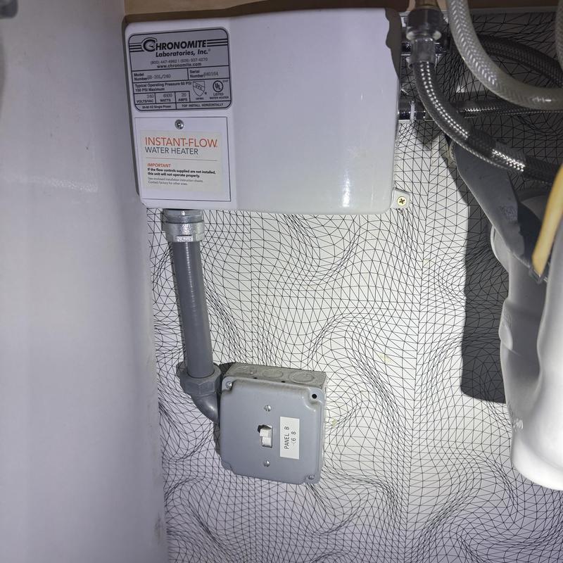 Instant-Flow water heater with electrical connection under sink