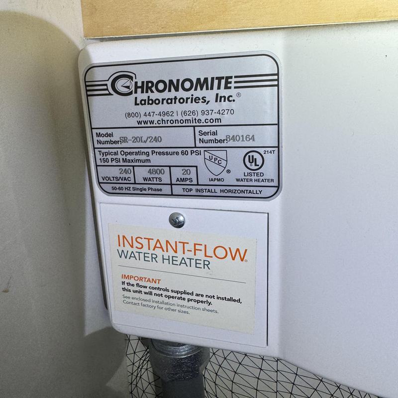Instant-Flow water heater label and specifications close-up