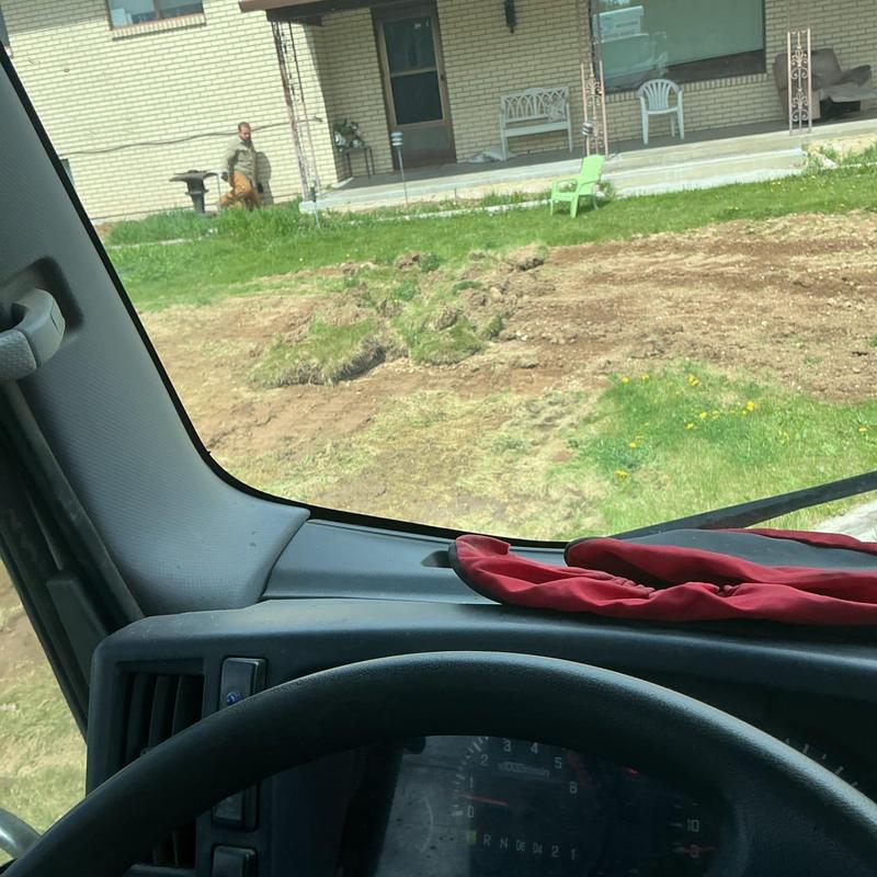 Septic system excavation site viewed from vehicle interior