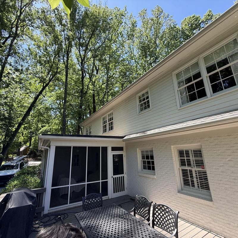 Roof-to-wall interface with new kickout flashing installation