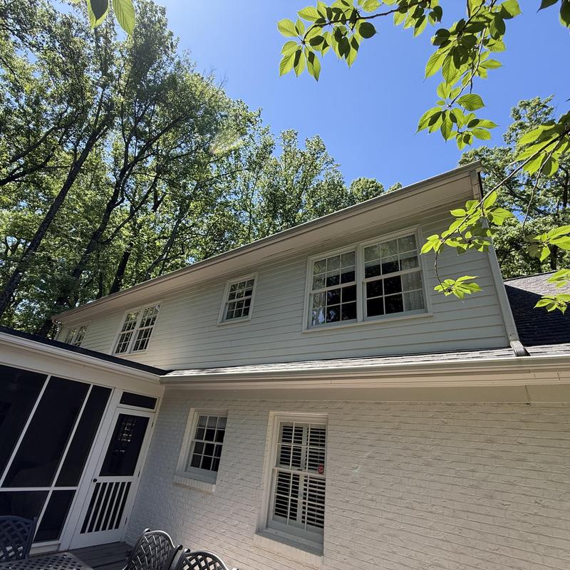 Roof-to-wall interface with new kickout flashing installation