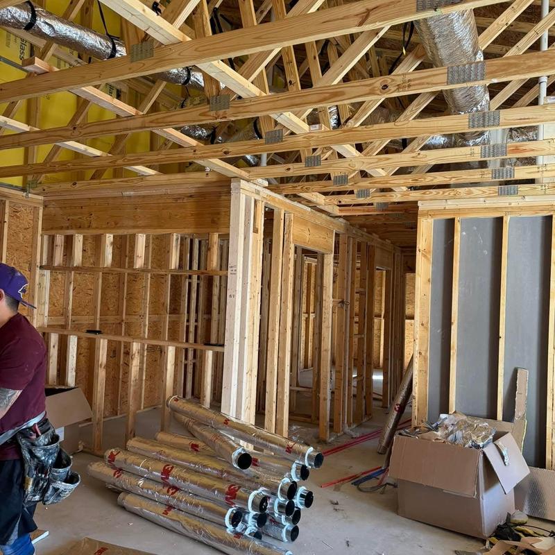Roof joists and ductwork installation in framing stage