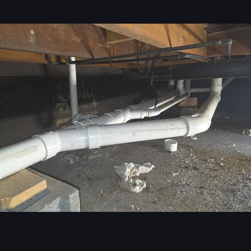 PVC drain pipes replaced in crawl space plumbing