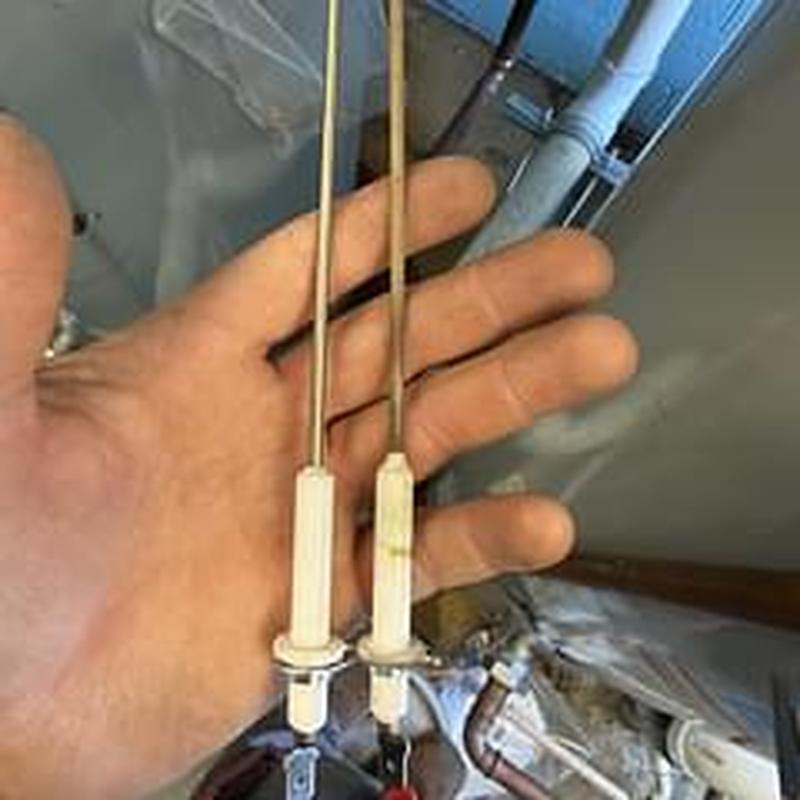 Flame rods for roof water heater installation