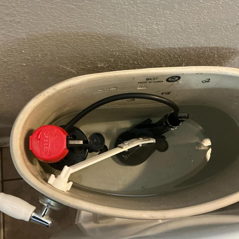 Toilet tank flapper and fill valve installation in Fort Worth