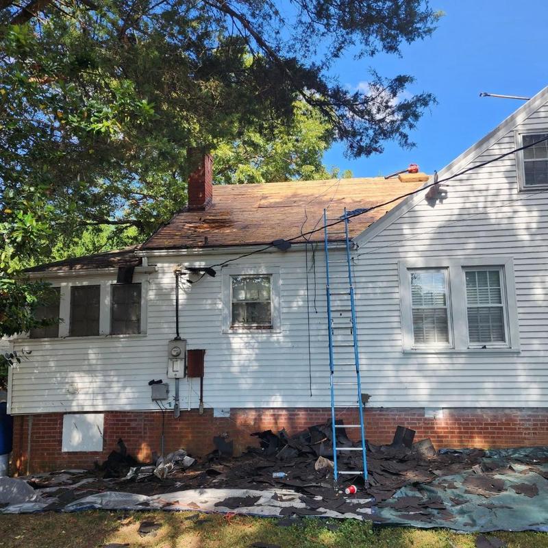 Owens Corning architectural shingle roof removal in progress Owens Corning architectural shingle roof removal in progress