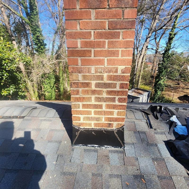Chimney flashing on shingle roof repair Spartanburg SC Chimney flashing on shingle roof repair Spartanburg SC