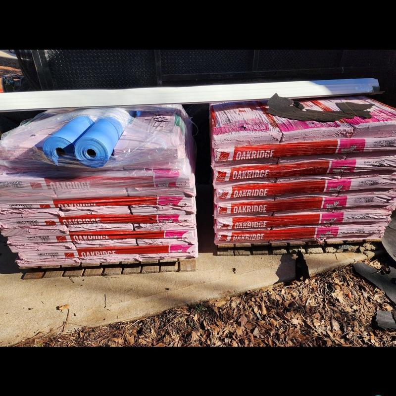 Owens Corning Oakridge Shingles stacked on pallets Owens Corning Oakridge Shingles stacked on pallets