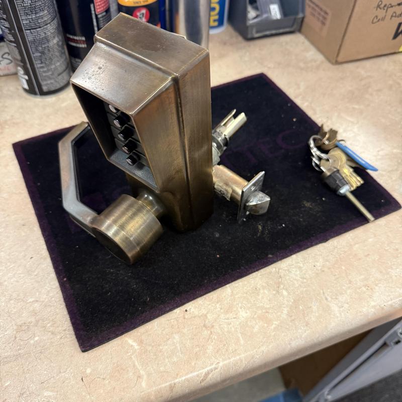 Access control keypad lock with keys on workbench