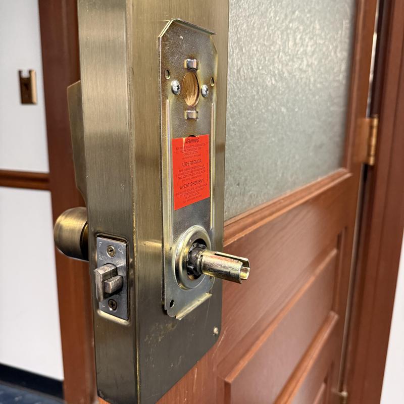 Mortise lock body removed from wood door frame