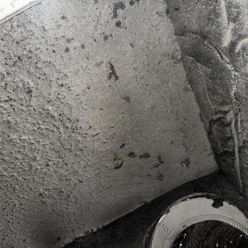 Downstairs HVAC return plenum with heavy soot buildup