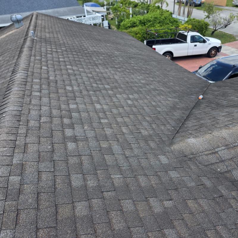 Asphalt shingle roof close-up with valley detail