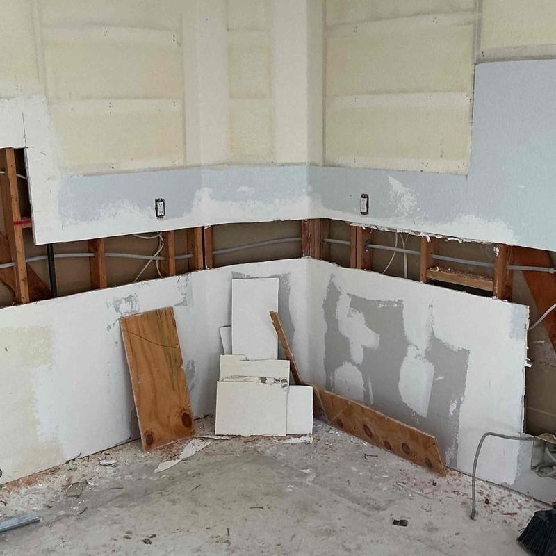 Kitchen sewer and waterline relocation with drywall removal