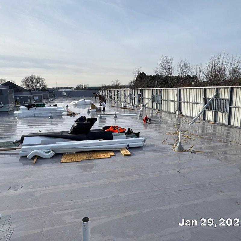 Carlisle TPO roofing system installation on commercial roof