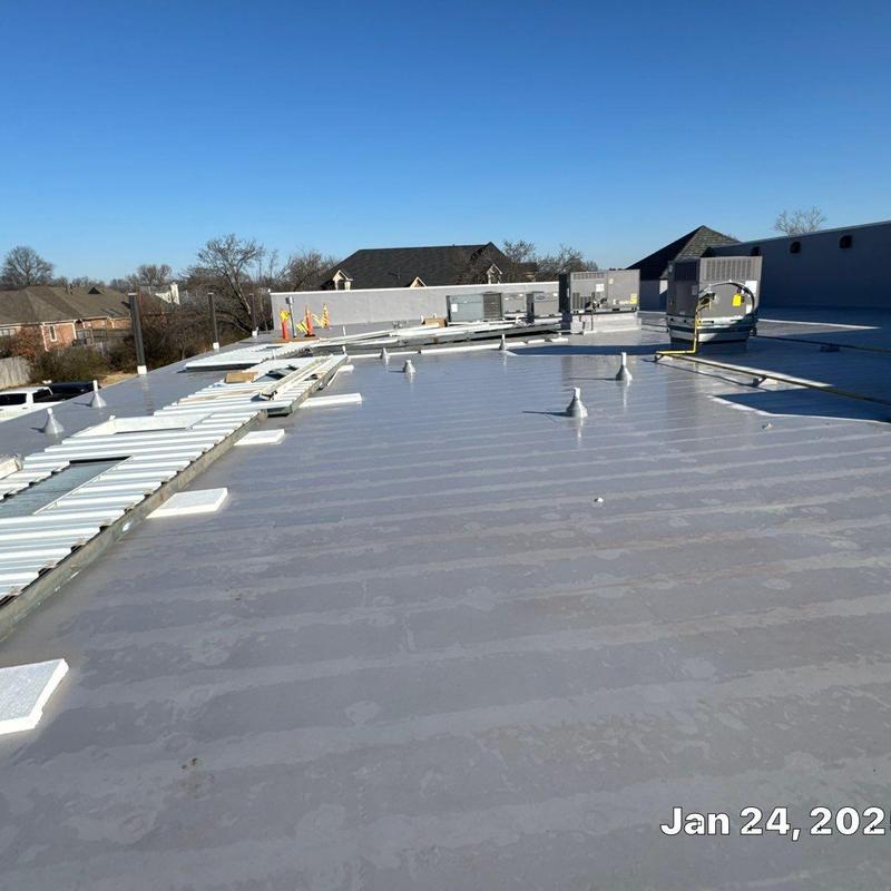 TPO roofing installation on commercial building roof
