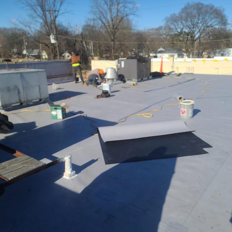 Carlisle TPO roofing system installation on commercial roof