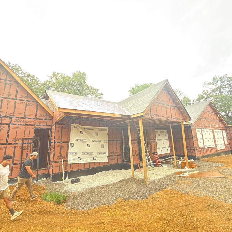 Roof sheathing and underlayment installation on new home