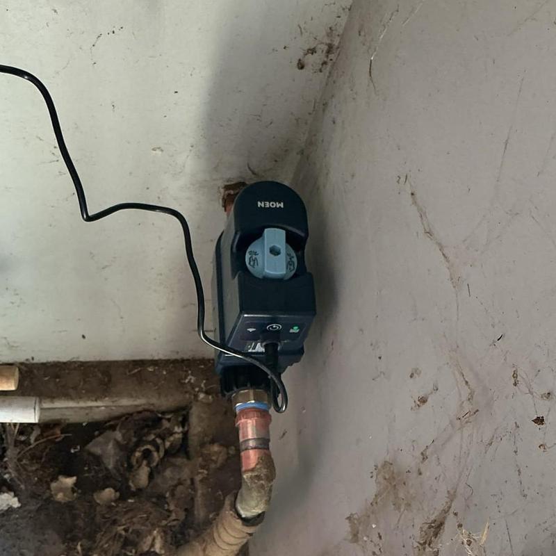 Moen Flo Smart Water Shutoff Valve installed on pipe