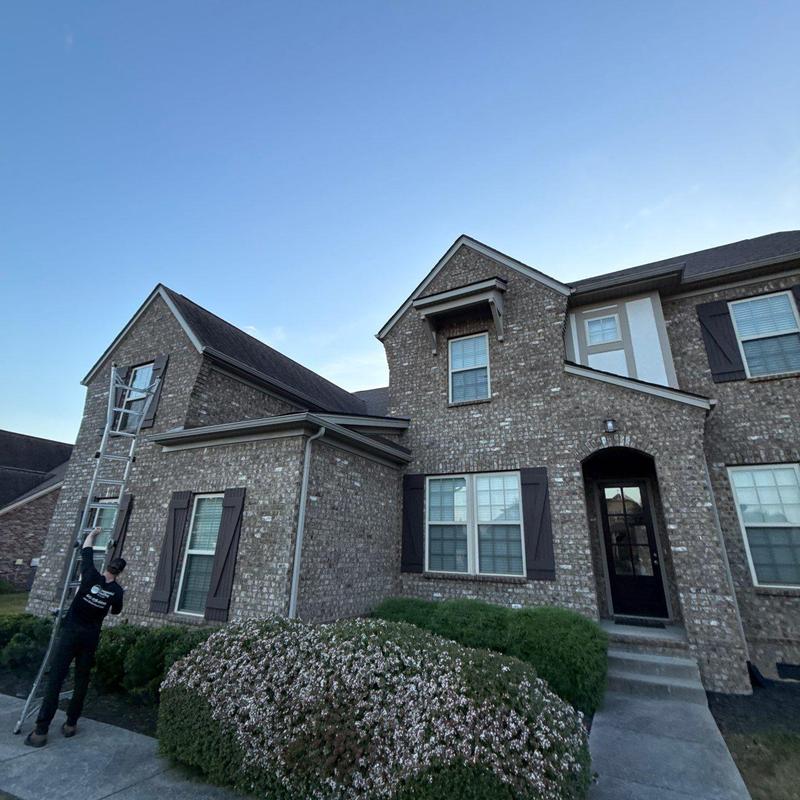 Roof shingles hail damage inspection with ladder setup