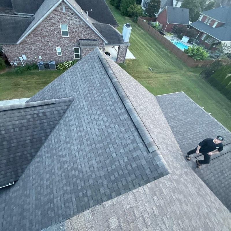 Architectural shingle roof with ridge cap inspection
