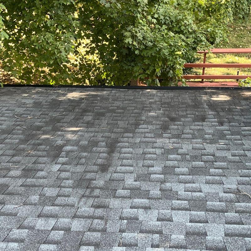 Composite shingle roof with wear and minor damage