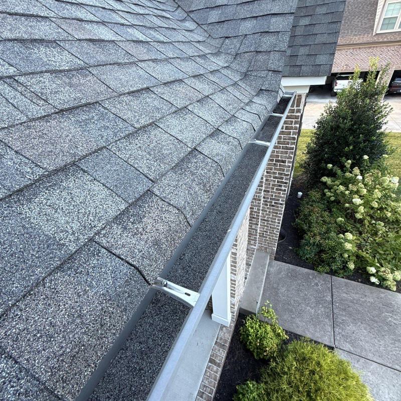 Roof shingles and gutter inspection with hail damage