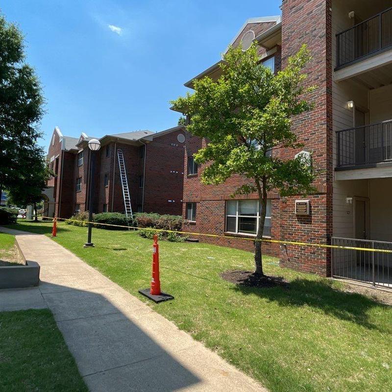 Roof ladder and safety tape at university building