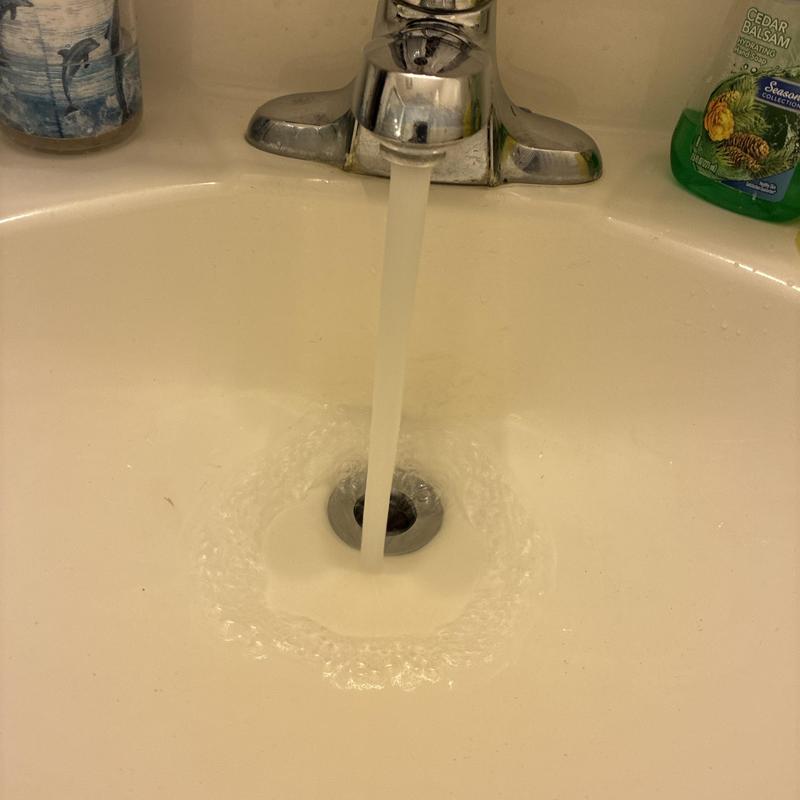 Bathroom sink faucet with running water