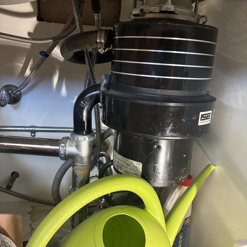 Garbage disposal unit installed under sink